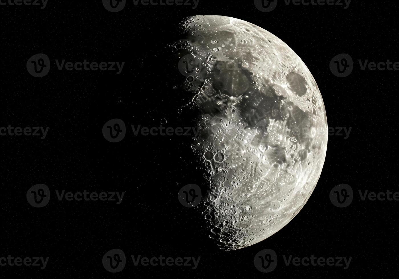 A beautiful shot captures the moon's surface with stunning details and dramatic shadows. photo