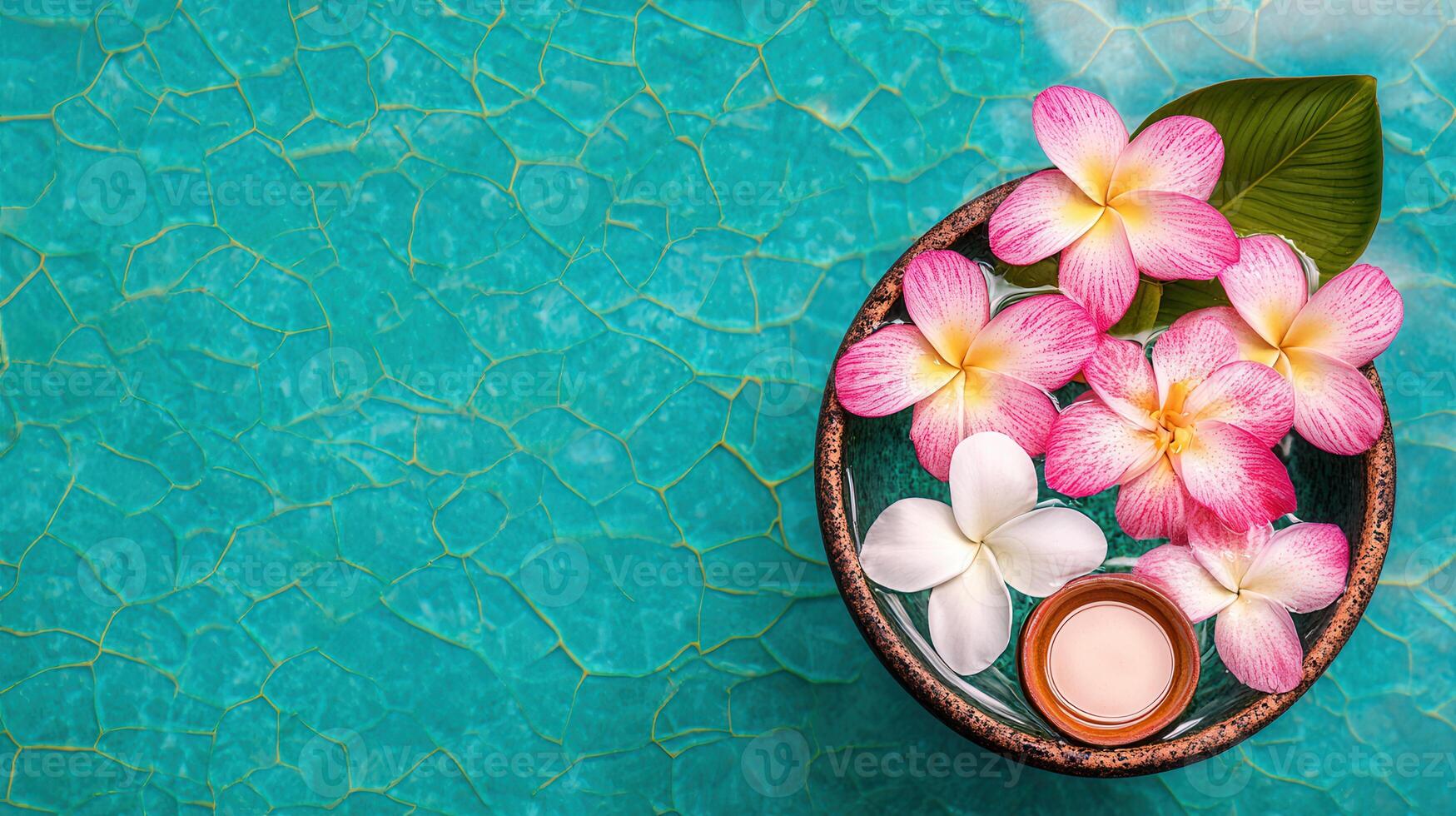 Relaxing Spa Scene Pink and White Plumeria Flowers Floating in Water with Candle photo