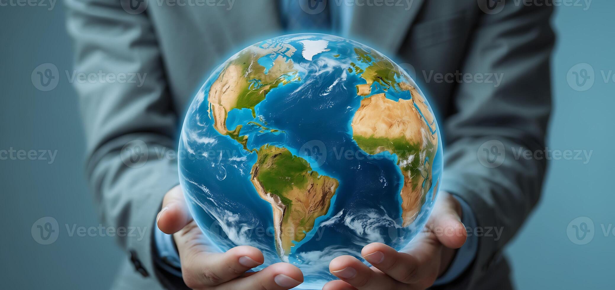 Holding the world in hands to symbolize responsibility toward climate change action photo