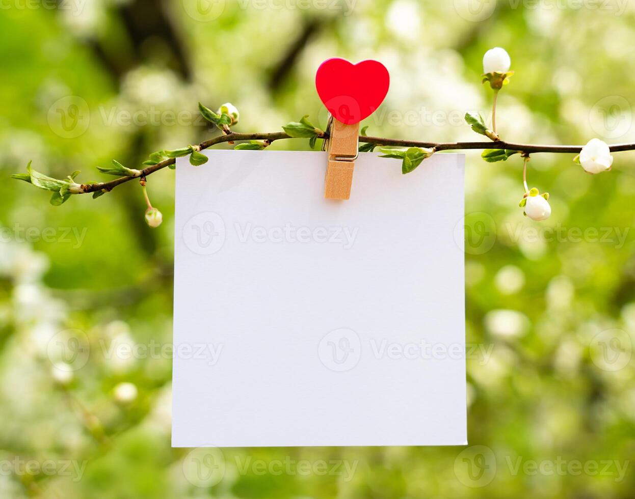 Card for Mother's Day and Valentine's day with a message with a heart. Mockup. Spring composition. Copy space. photo