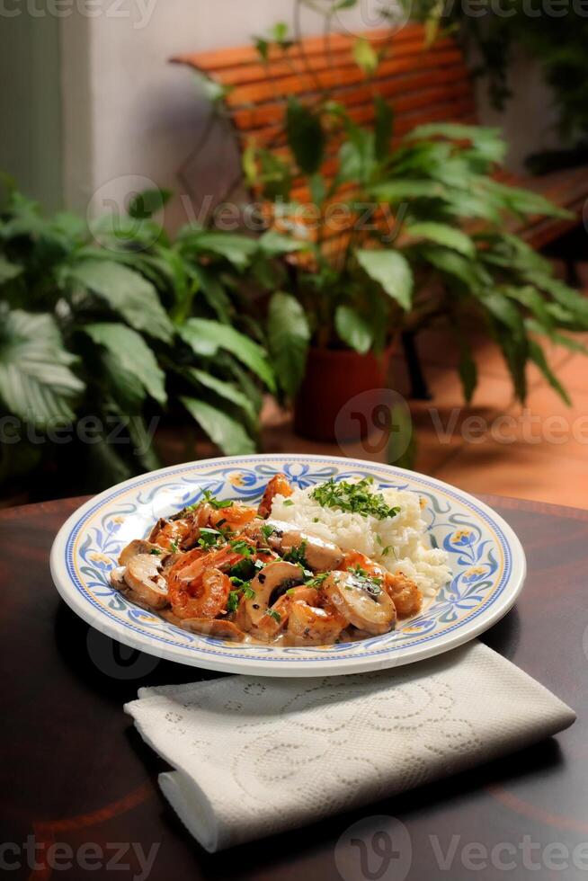 King George style prawns, prawns with salt, black pepper, whiskey, cream and olive oil photo