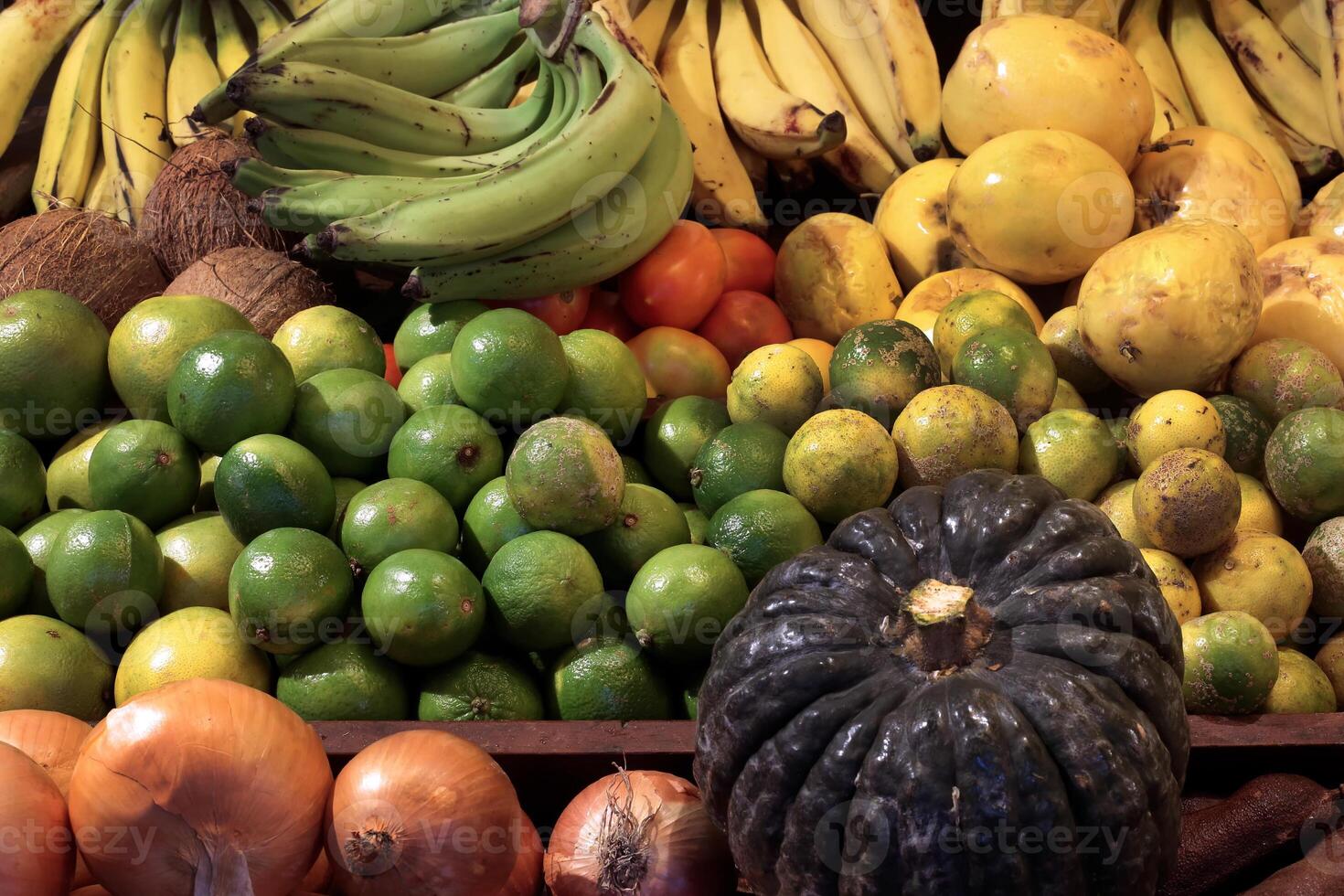 fruits and vegetables gathered on a wooden tray in a typical Brazilian restaurant photo