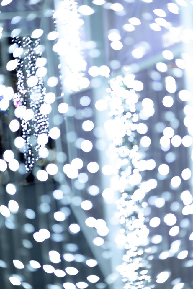 abstract blur bokeh white blue neon light dots background photo