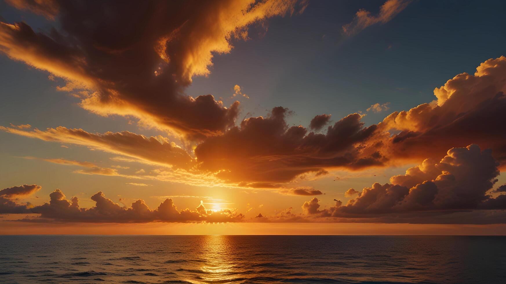 A stunning golden-hour landscape featuring a vivid sunset sky over a calm ocean photo