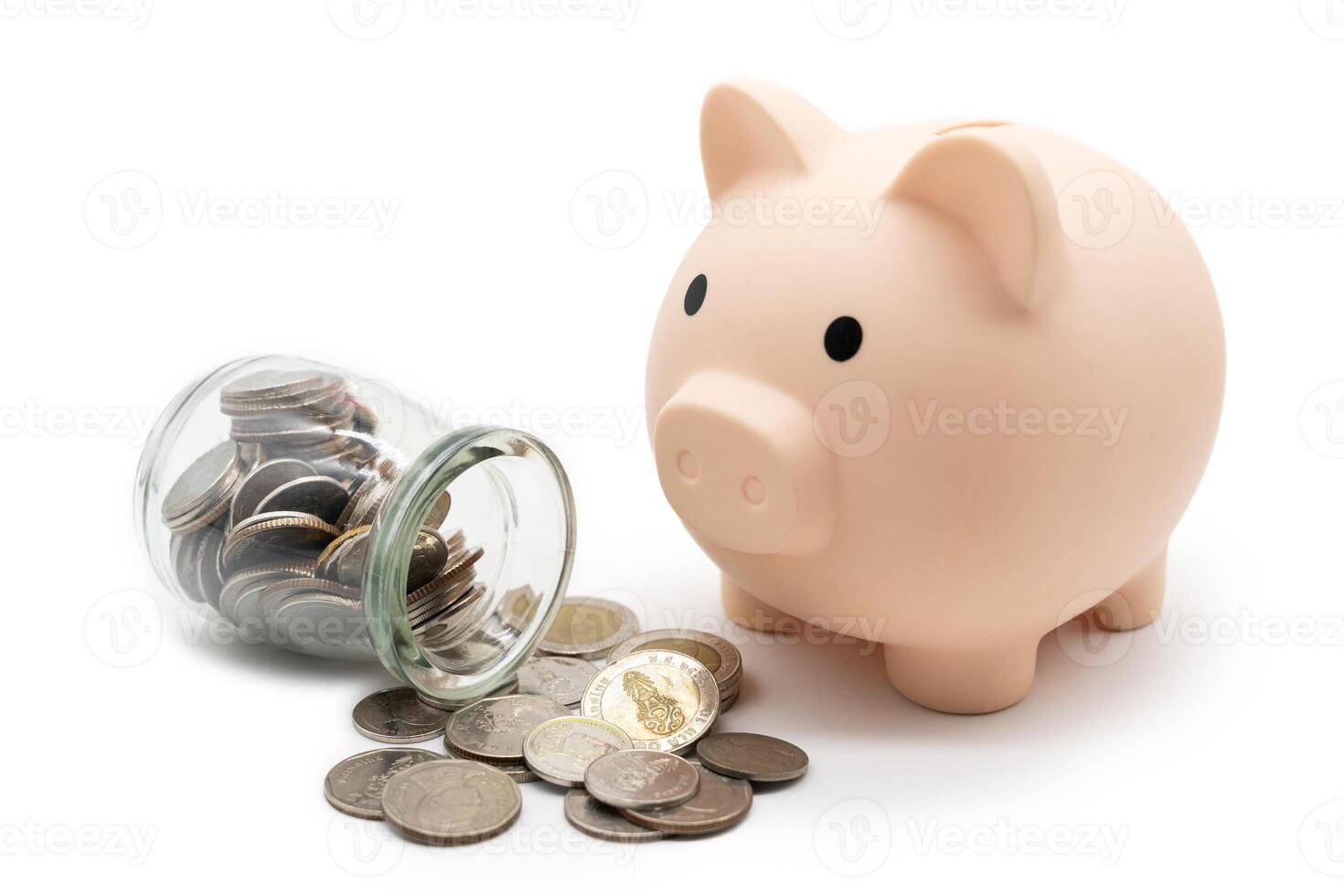 Piggy Bank with Thai Baht Coins spilled out of jar glass, Financial business investment, Growing money. isolated on white background. photo