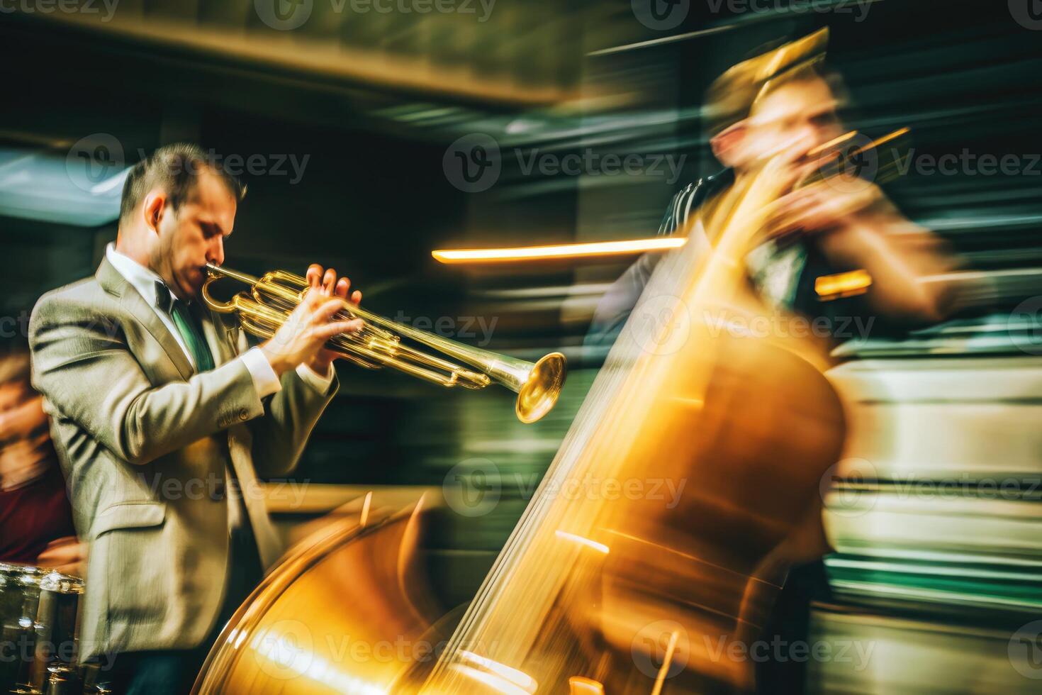 Musicians performing lively jazz music in a dimly lit venue during a nighttime event photo