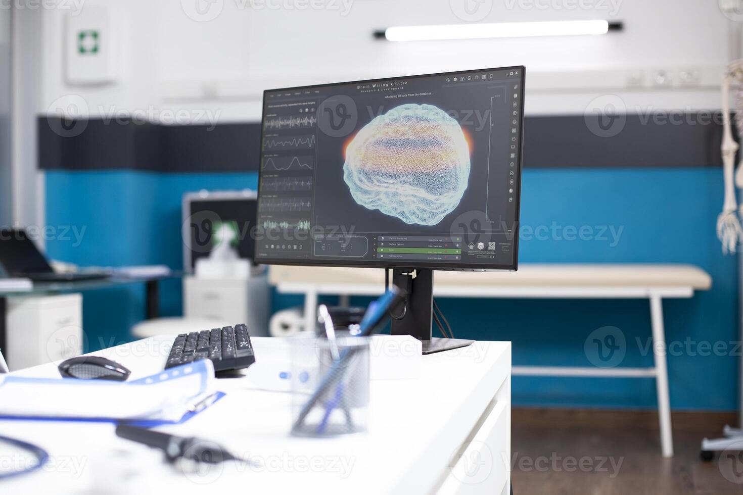 Medical office with no staff has computer monitor displaying brain damage analysis deal, for health diagnostics. Hospital room is organized with files and modern doctor tools. photo
