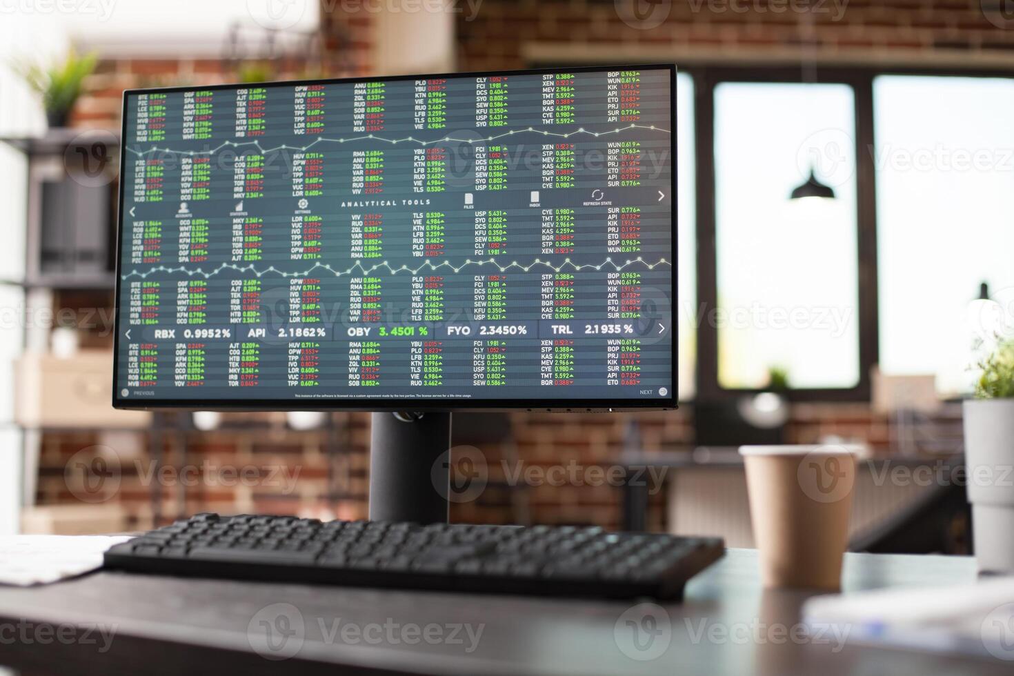 Closeup of desktop pc screen in office shows financial analytics, set up for market strategy research. Modern workspace with computer ready for business planning, displaying company analysis tools. photo