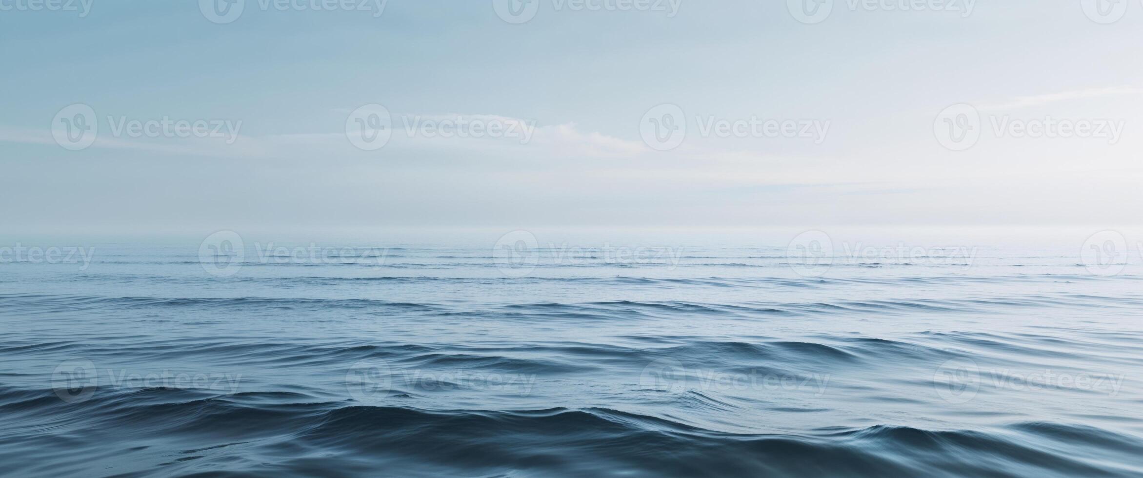 A view of the ocean with waves and sky photo