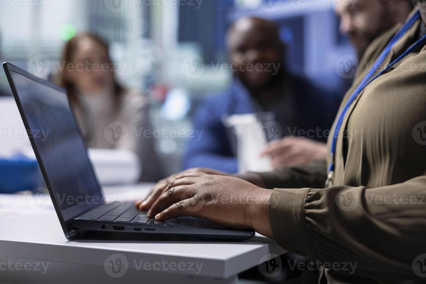 Photovoltaics factory worker analyzing data, reviewing system health metrics with laptop. Solar panels manufacturing plant employee troubleshooting technical issues using notebook, close up photo