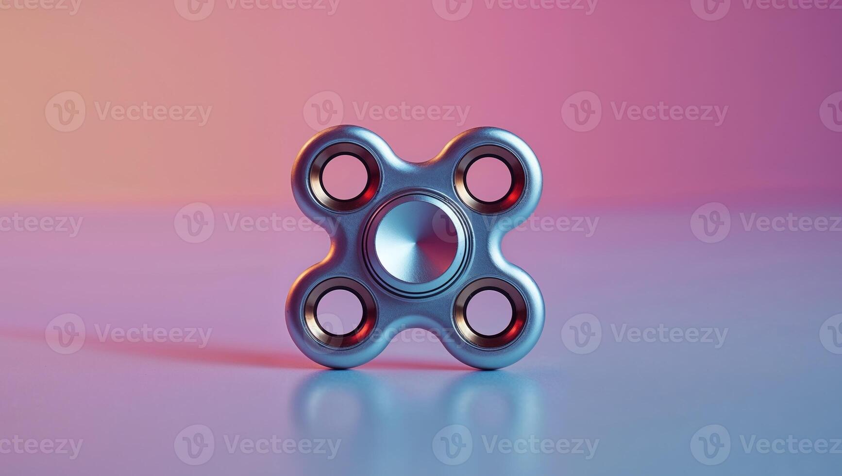 silver fidget spinner toy in a bright background. photo