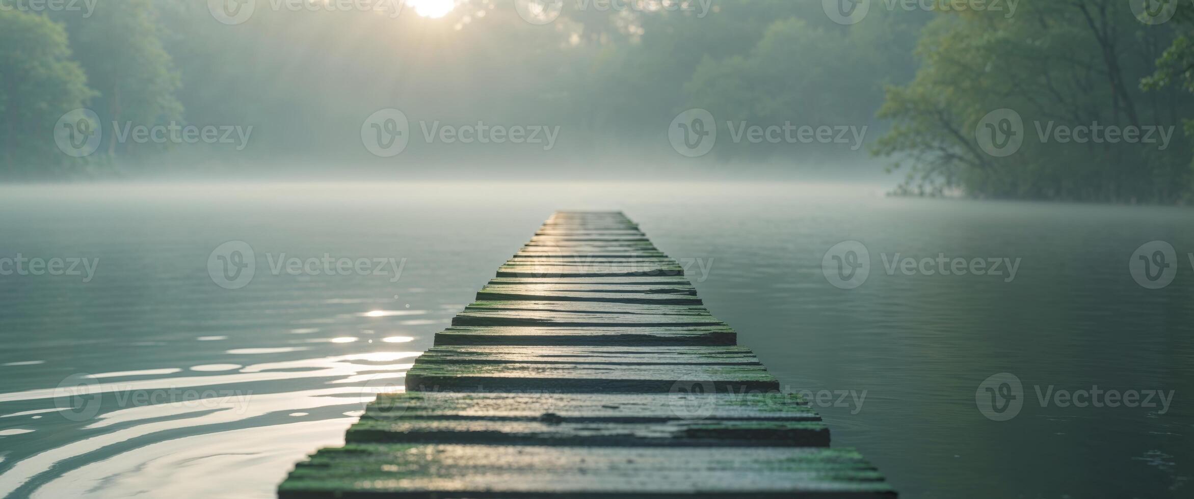 A wooden pier in the middle of a lake photo