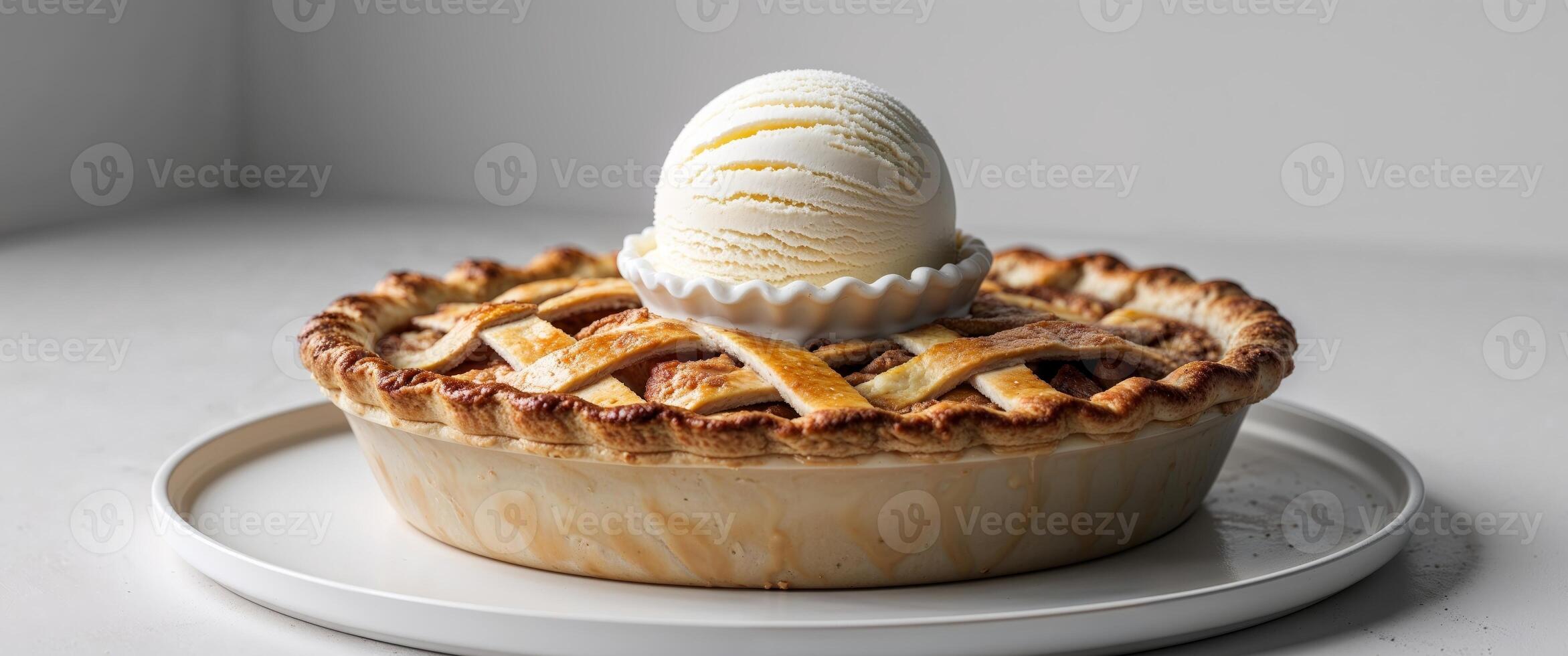 A pie with ice cream on top photo