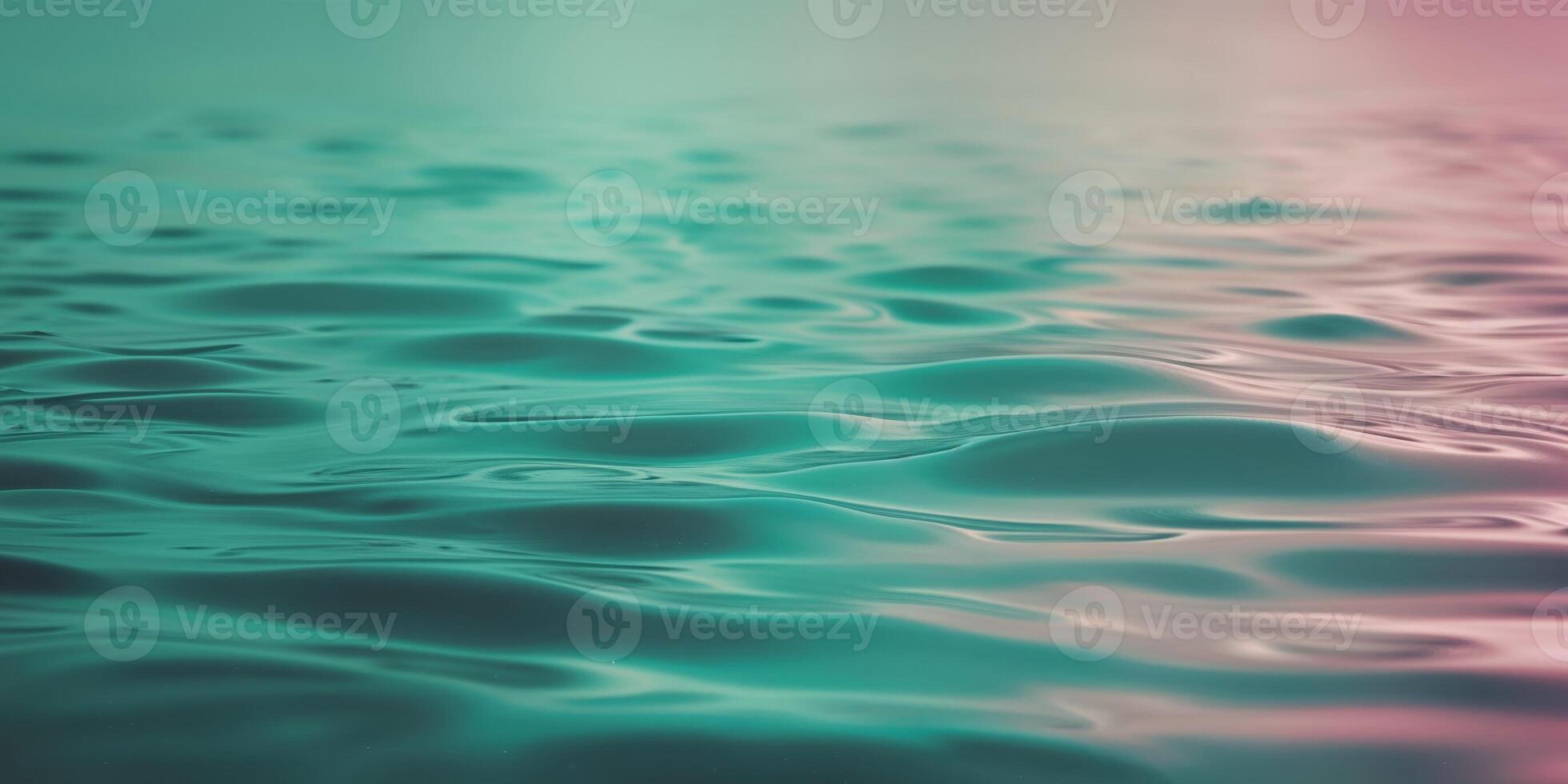 Water surface with ripples and waves in a pink and blue color photo