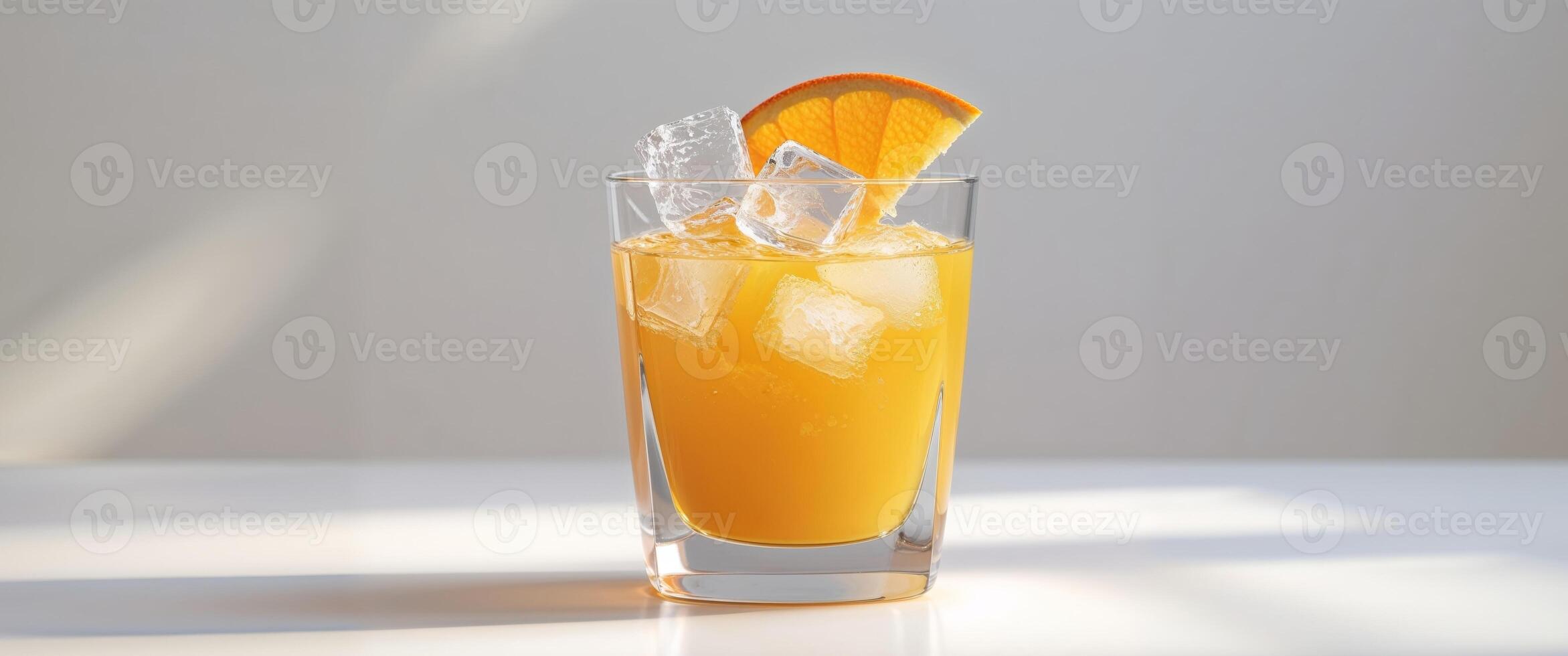 Orange juice cocktail with ice photo