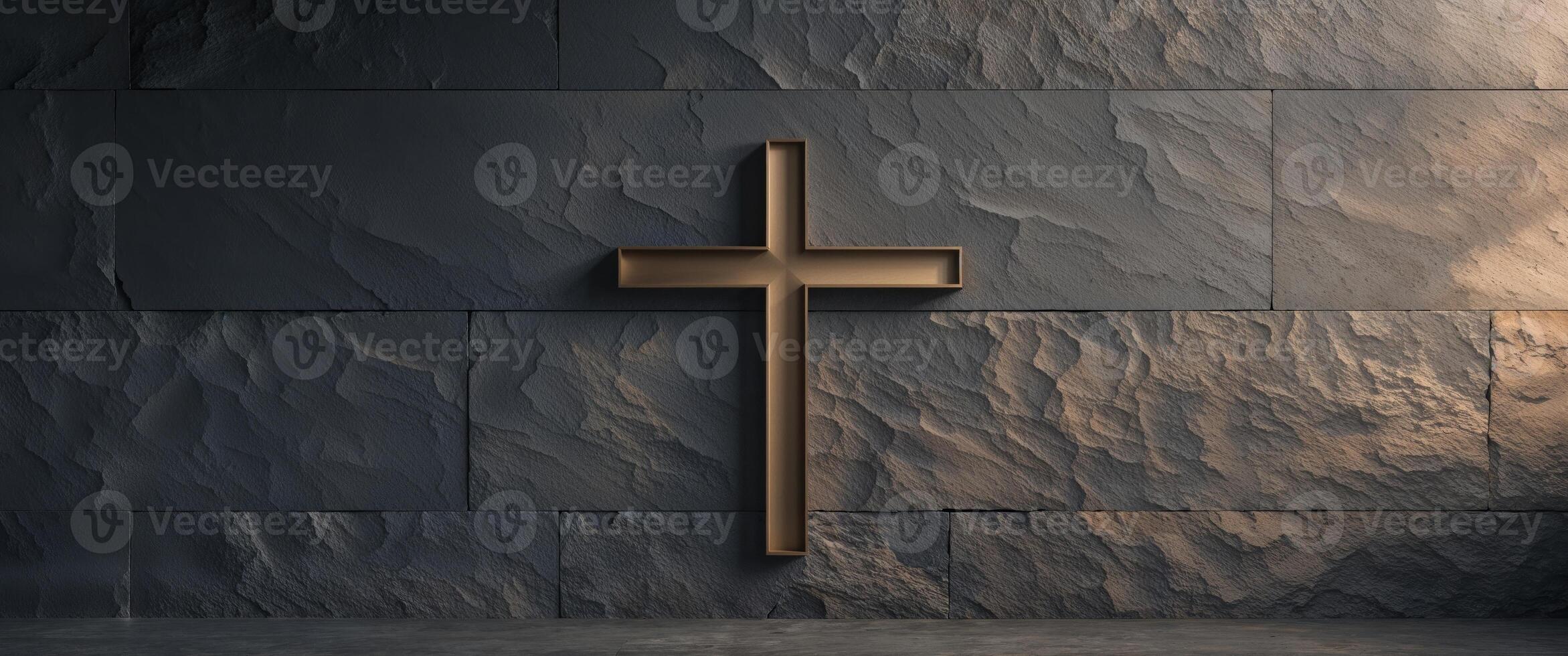 Dark stone wall with a bronze cross design. photo