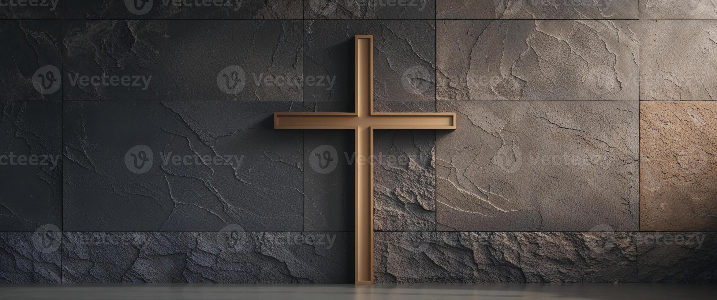 Dark stone wall with a bronze cross design photo