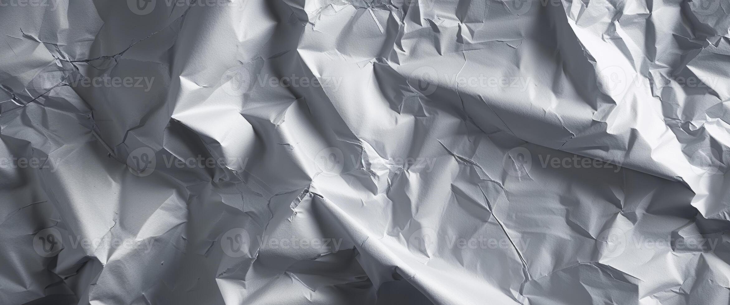 Highly Textured Crumpled Gray Paper Background. photo