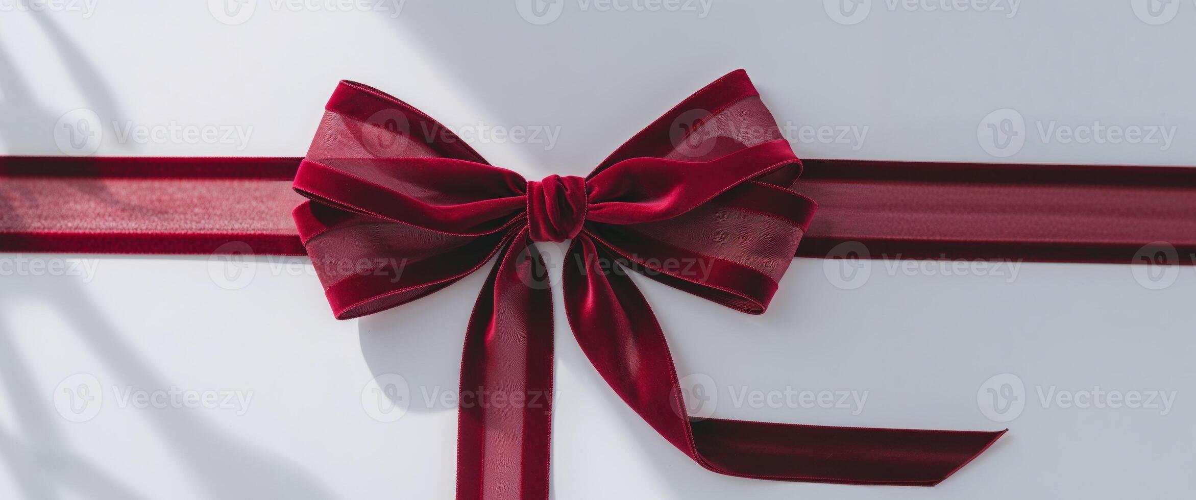 Exquisite Crimson Silk Ribbon Bow A Touch of Elegance and Festive Charm photo