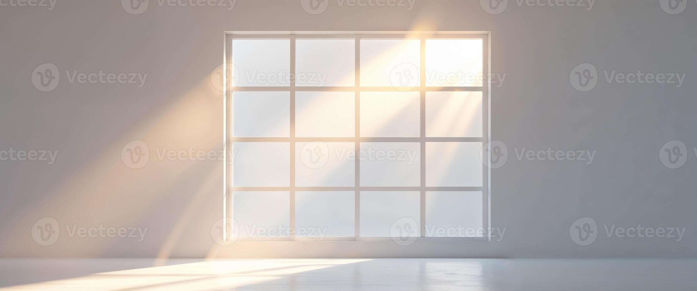 A large window in a white room with sunlight shining through it photo