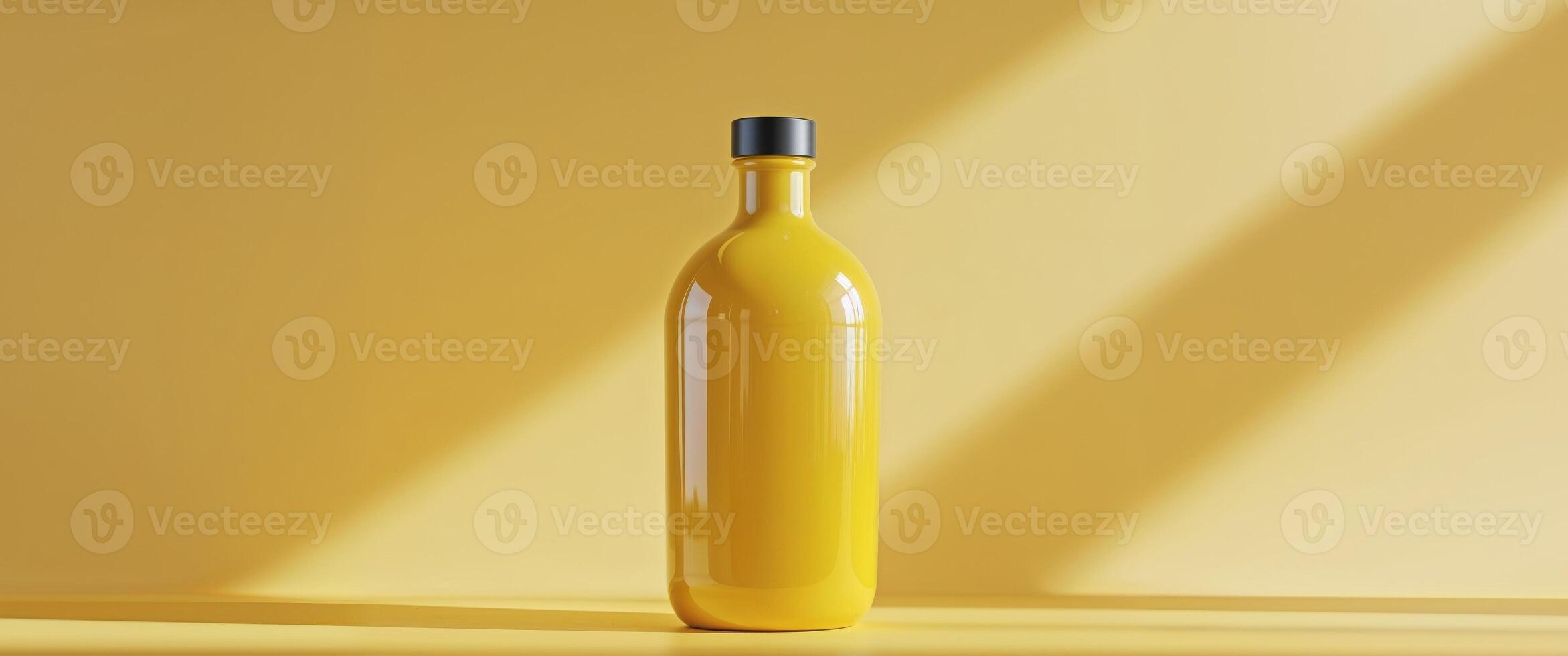 Yellow bottle stands out in a monochromatic yellow scene. photo