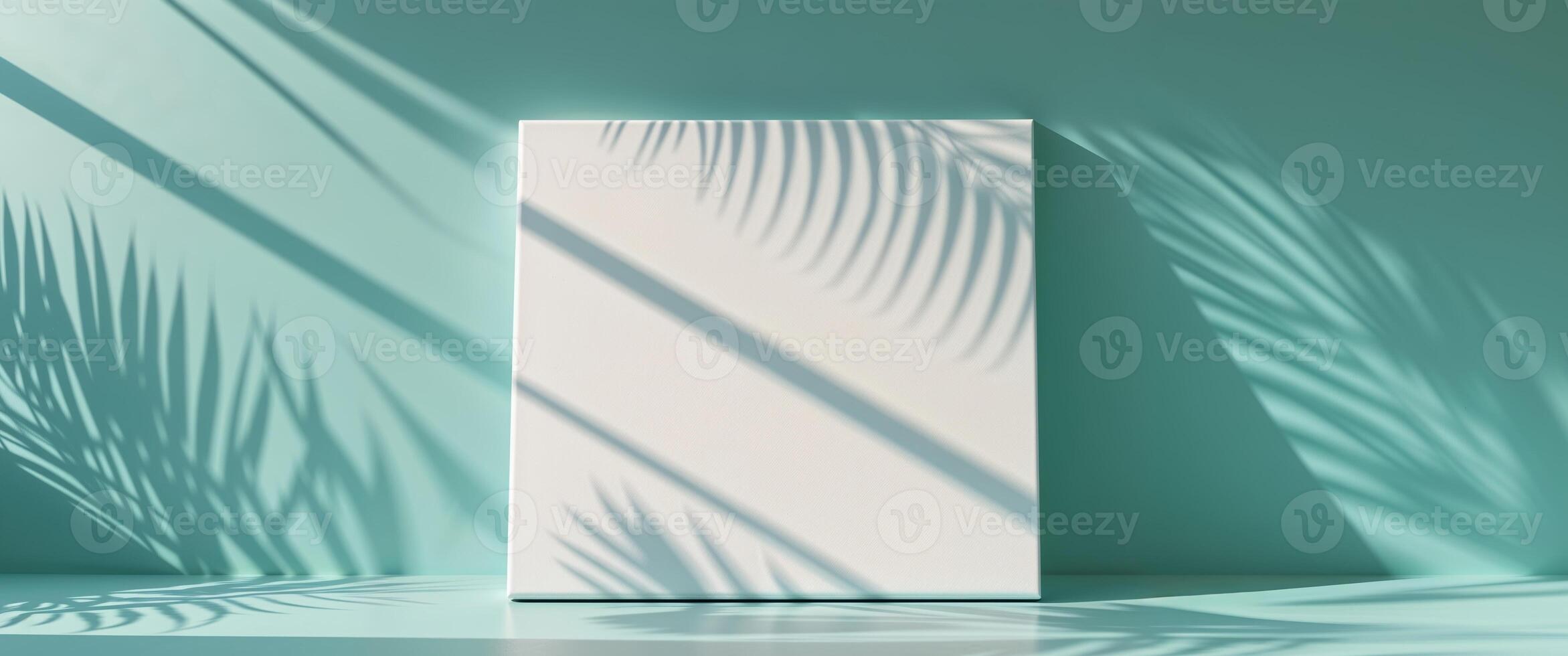 Blank white board on a green background with palm leaves photo