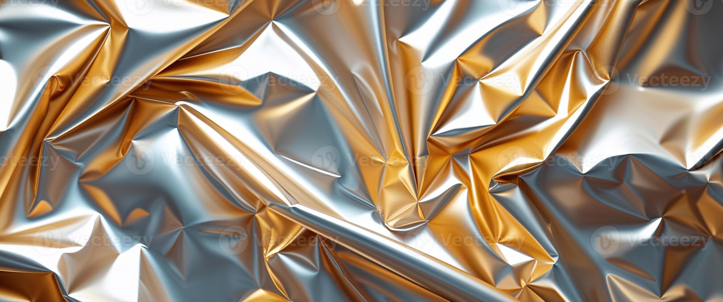 Gold and silver crumpled foil texture background photo