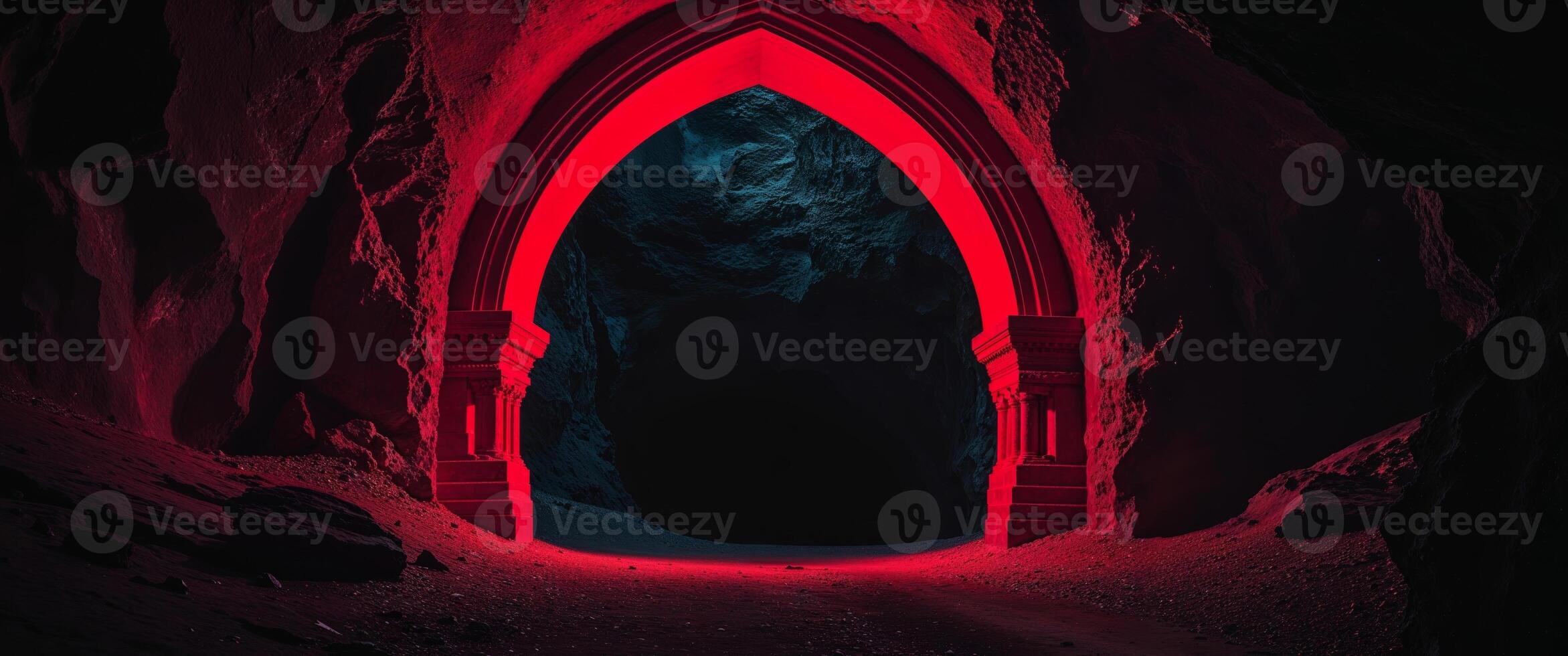 Glowing Red Archway Entrance to a Dark Cave photo