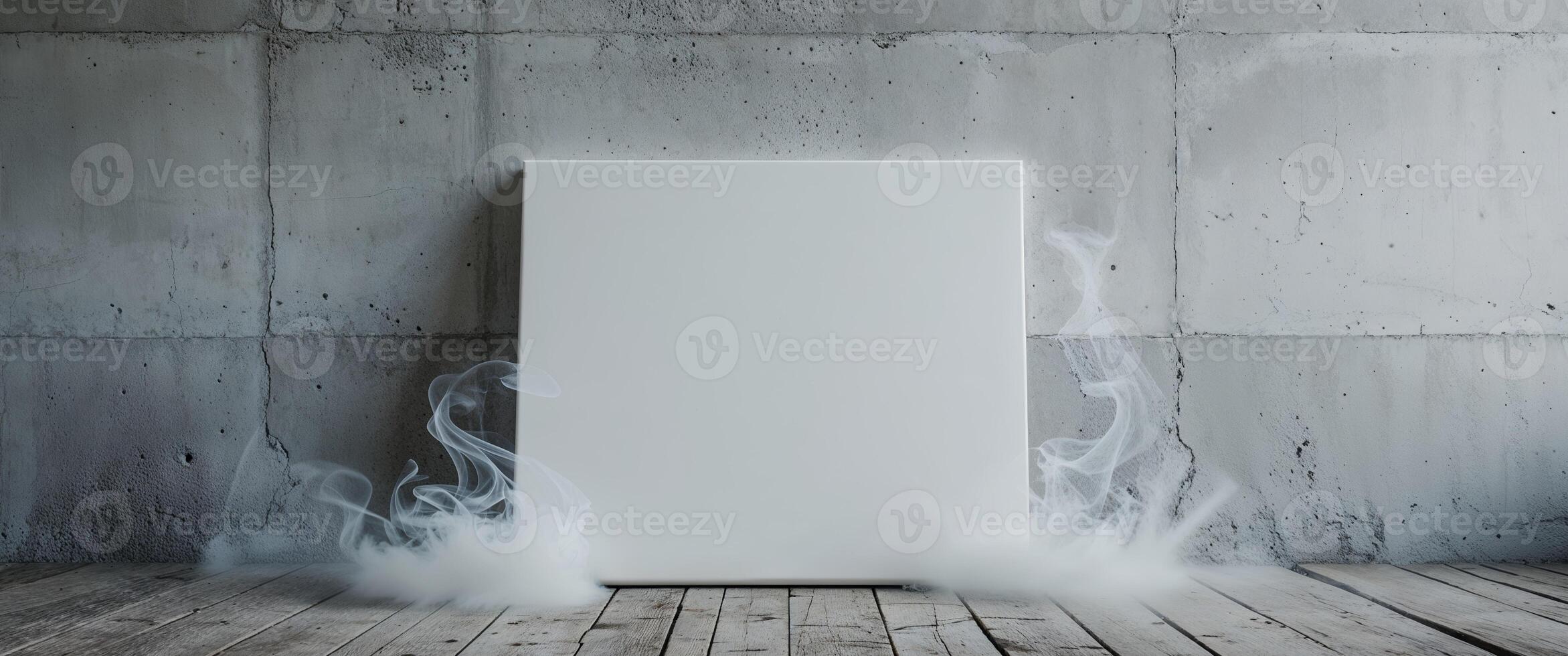 White blank canvas standing on wooden floor in a room with concrete wall and smoke effect. photo