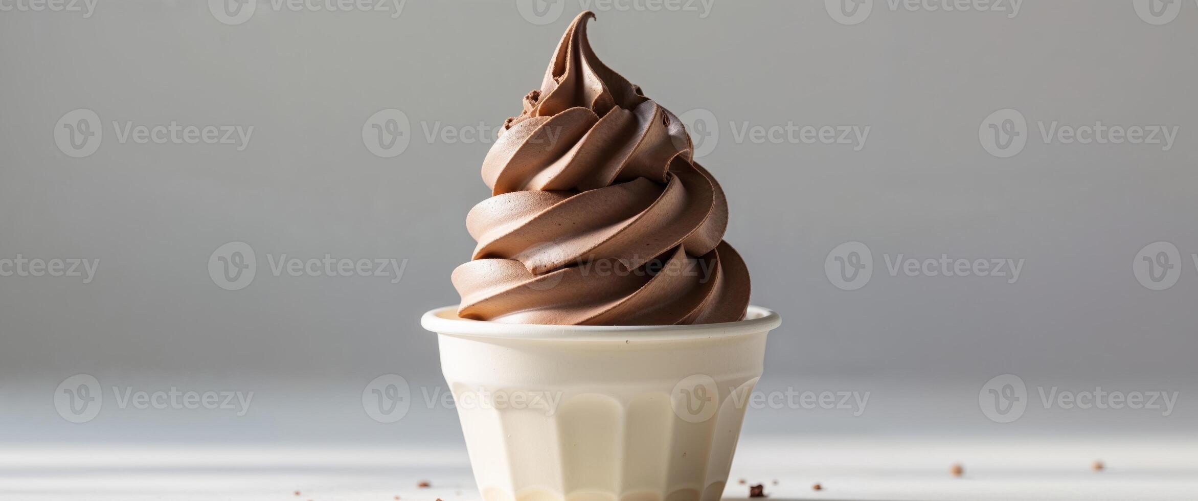 Delicious Chocolate Swirl Cup of Creamy Soft Serve Dessert photo