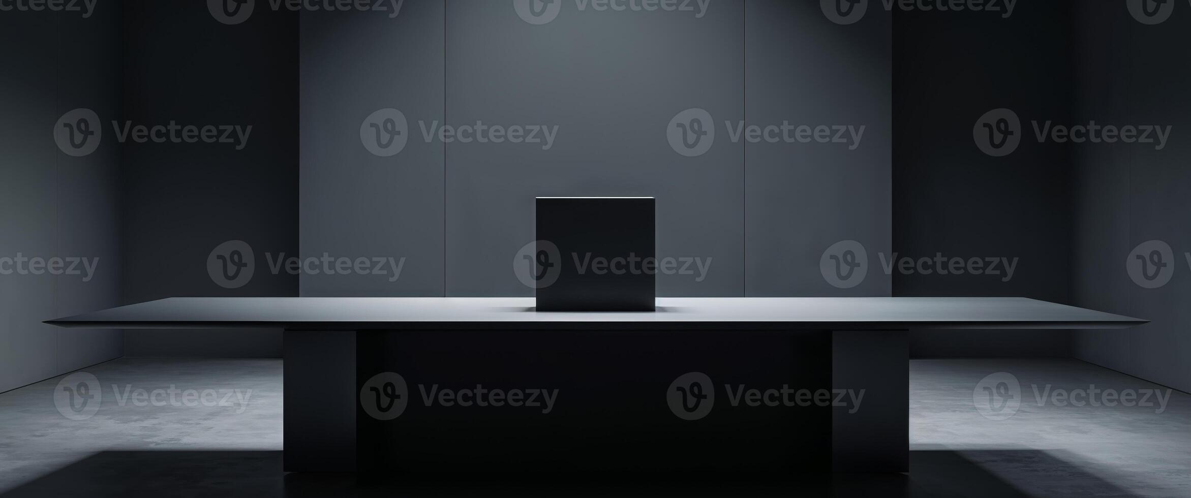 A black table with a square object on top photo