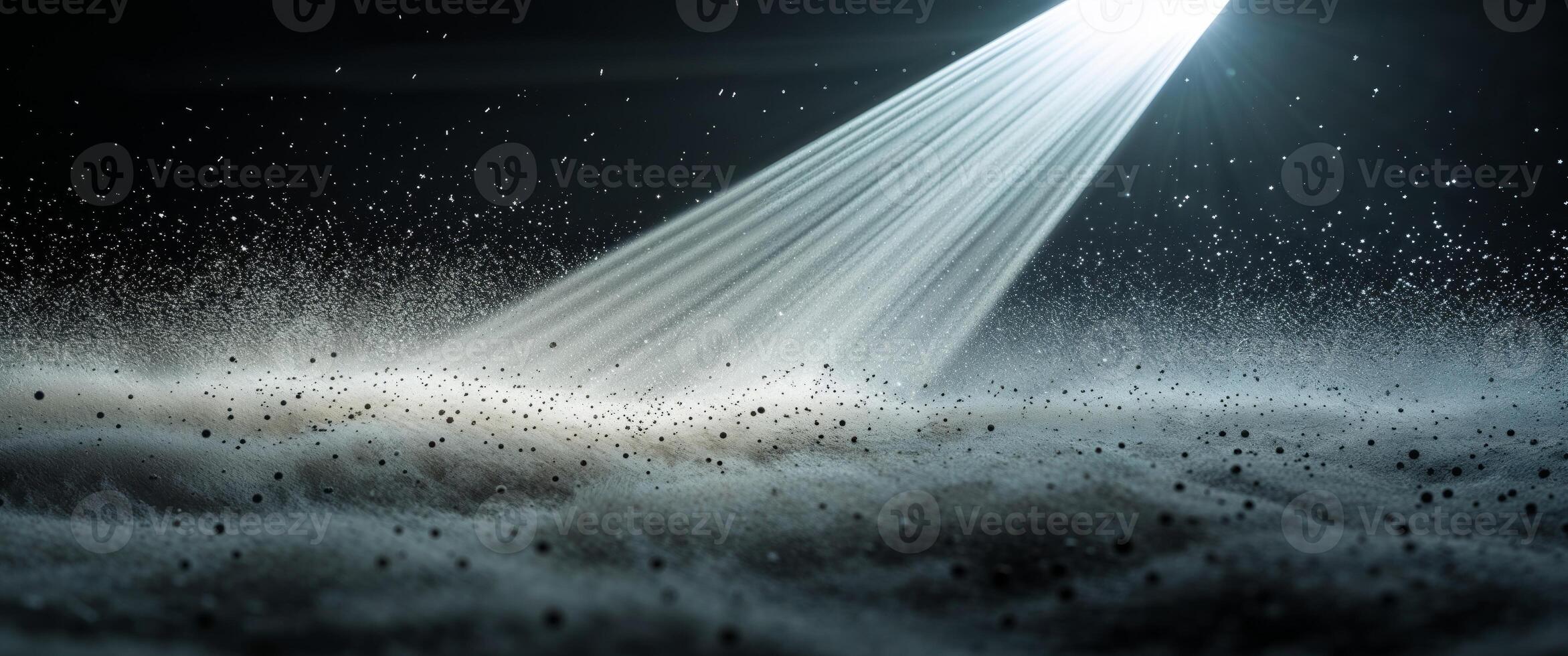 Stunning beam of light illuminating dust particles in dark space creating a mesmerizing visual effect. photo