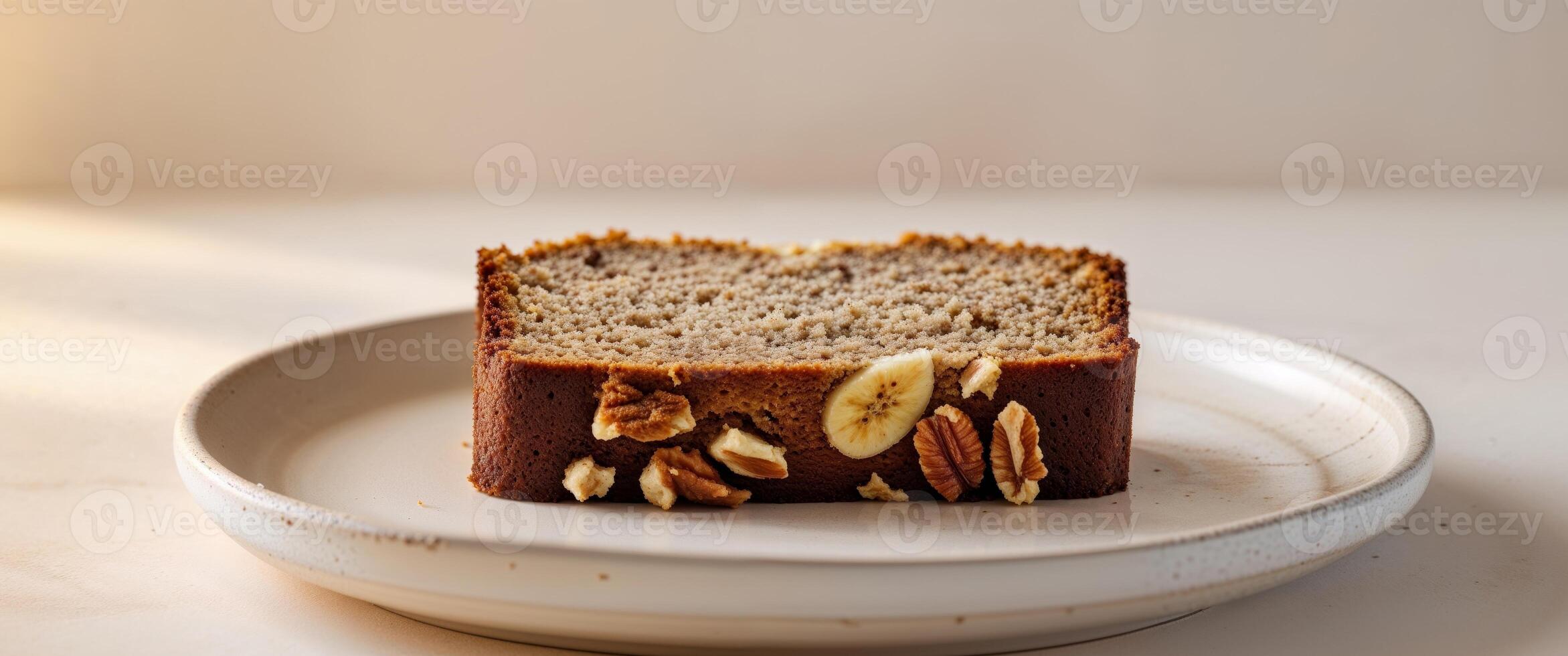 A slice of banana bread on a plate photo