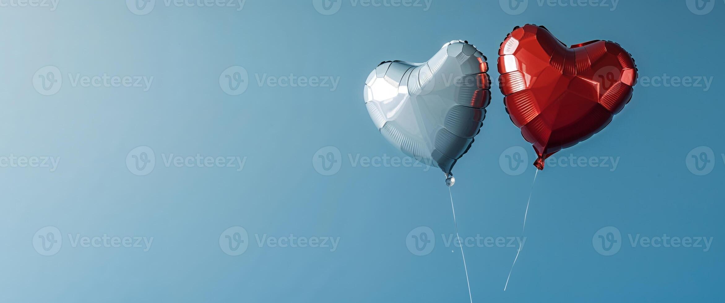 Red and White Heart Balloons on Blue Background. photo