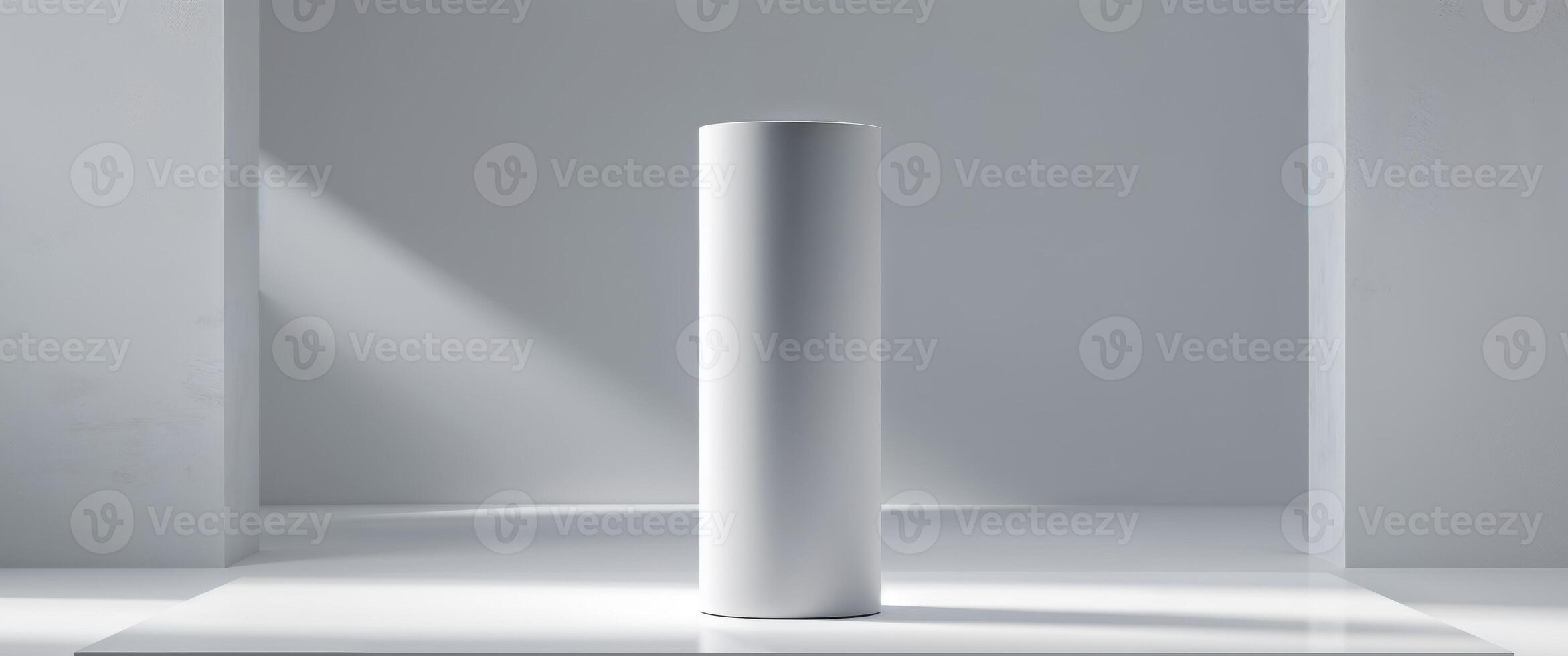 A tall white pillar in a room with a white floor photo