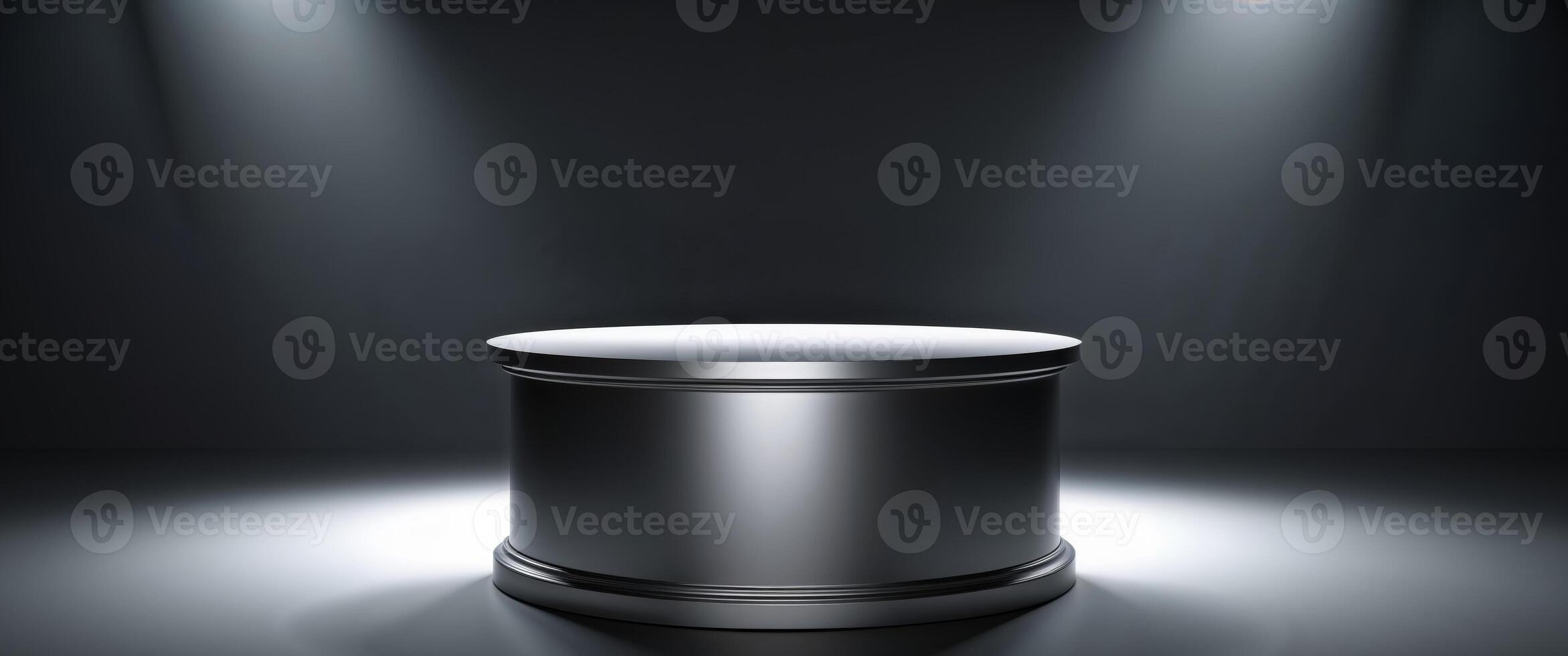 An empty metal cylinder on a dark background photo