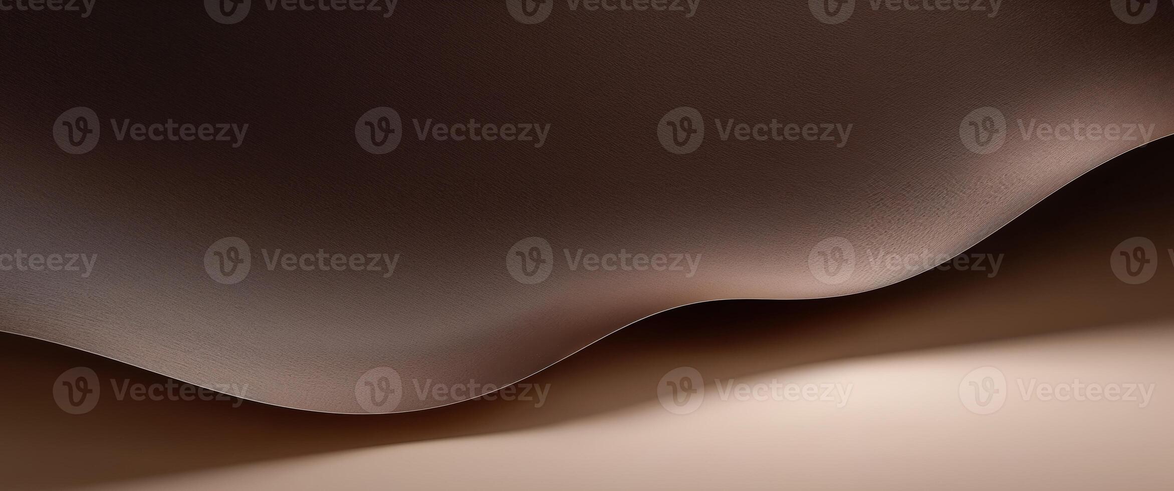 A brown wave on a surface with a light source photo