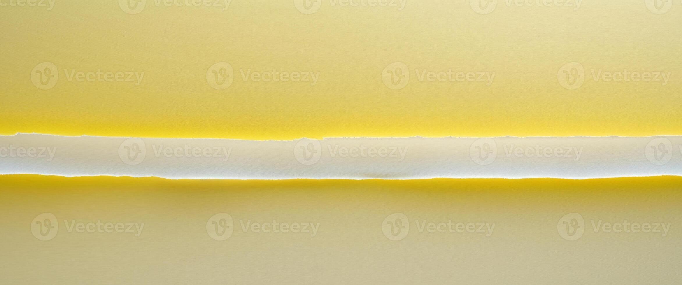 A yellow wall with a white line on it photo
