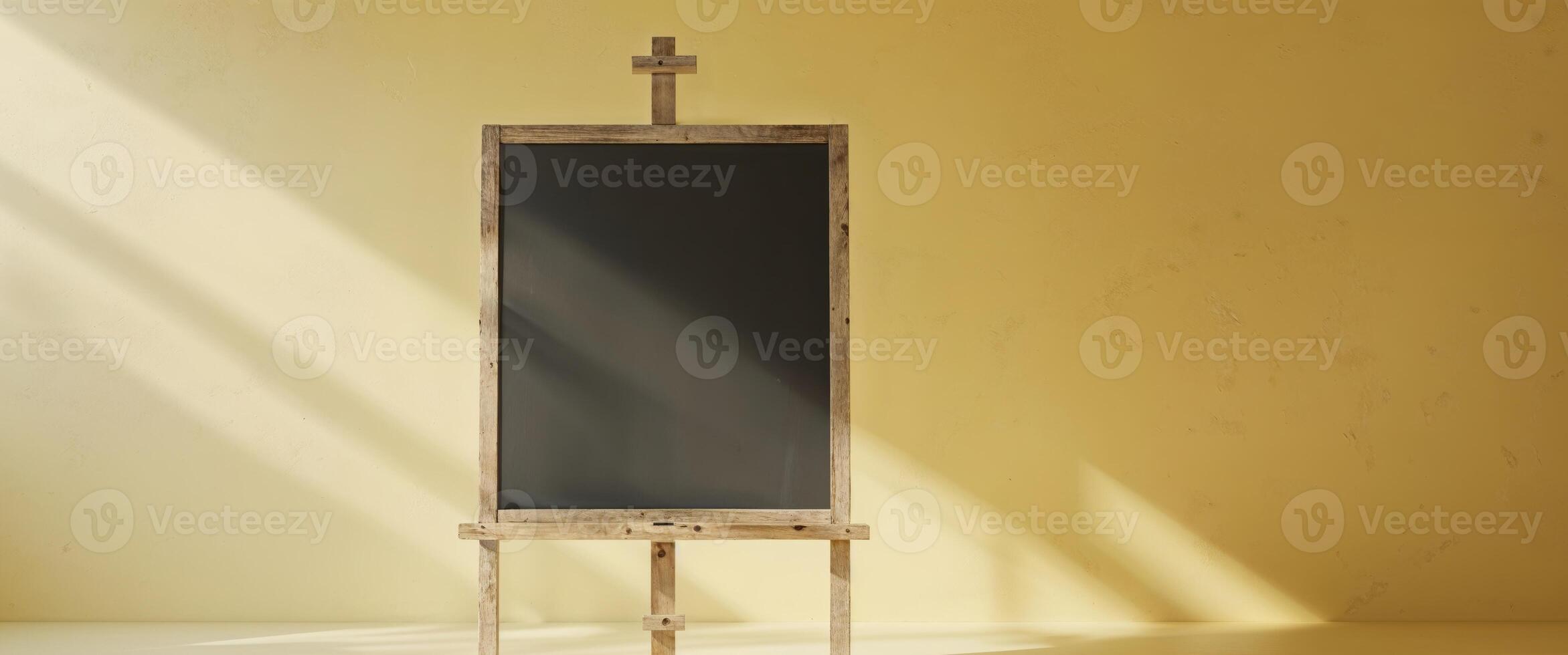 A wooden easel with a chalkboard on it photo