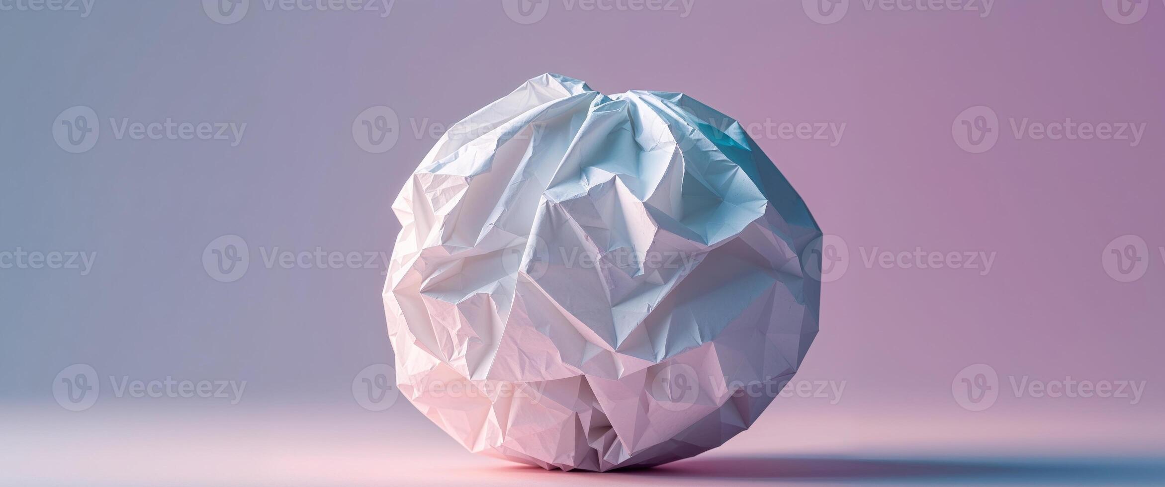 Crumpled White Paper Ball on Bright Background for Creative Use photo