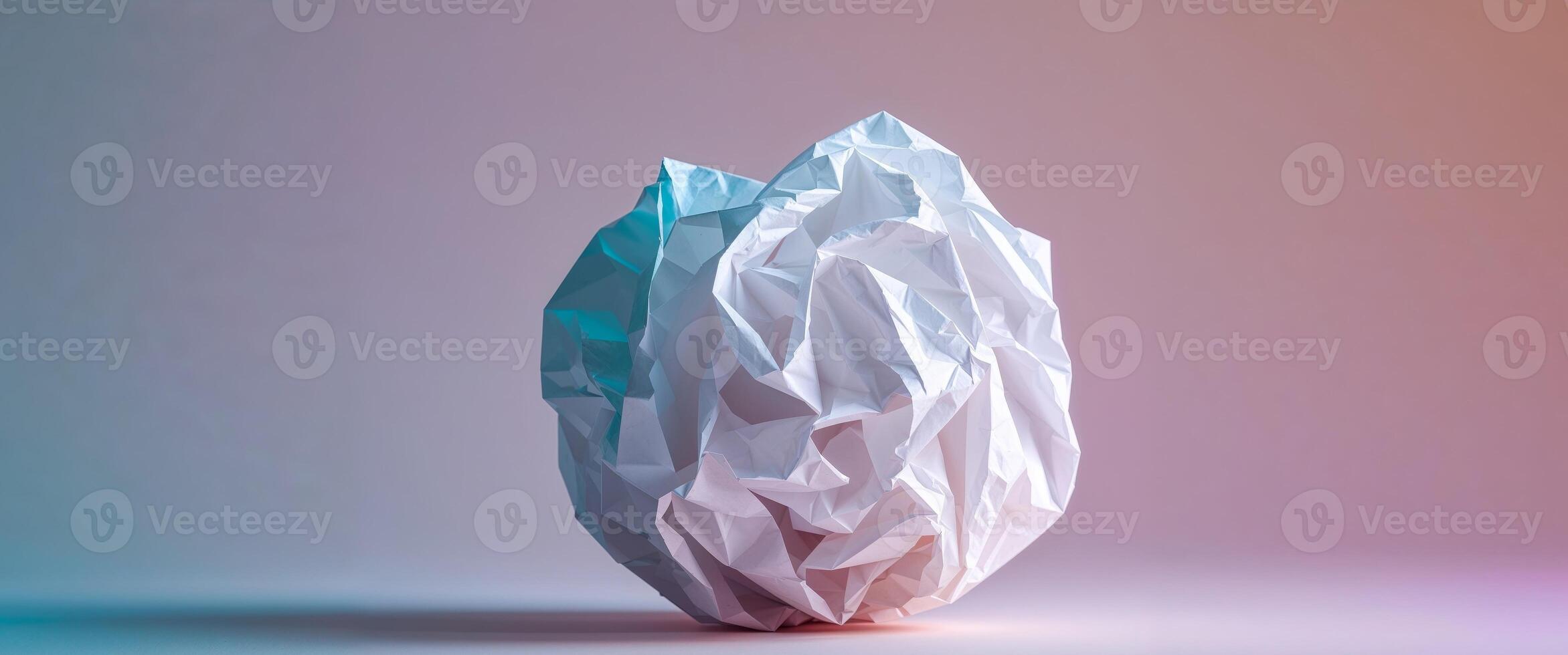 Crumpled White Paper Ball on Bright Background for Creative Use. photo