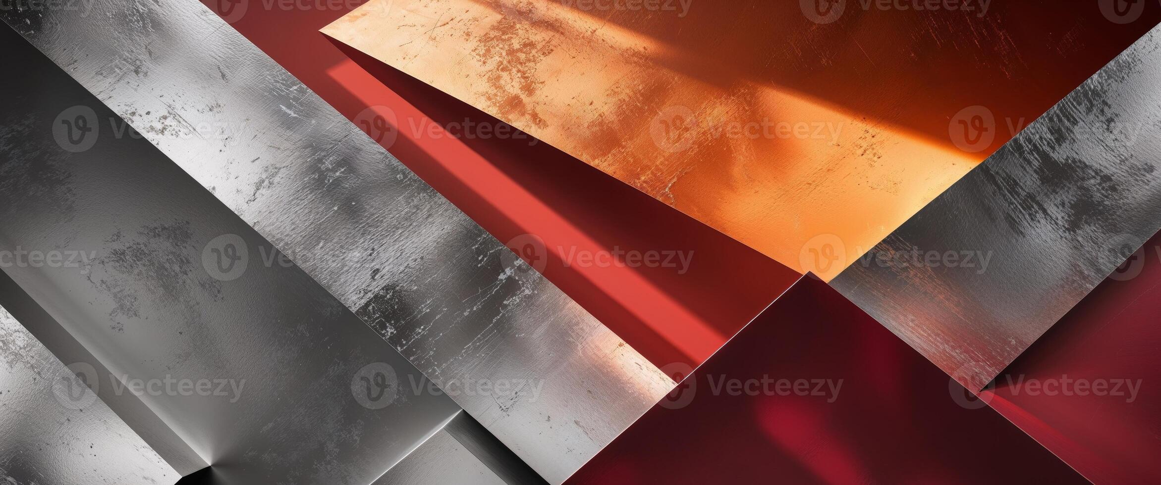 Abstract textured planes in silver orange and red with diagonal shadows creating geometric shapes. photo