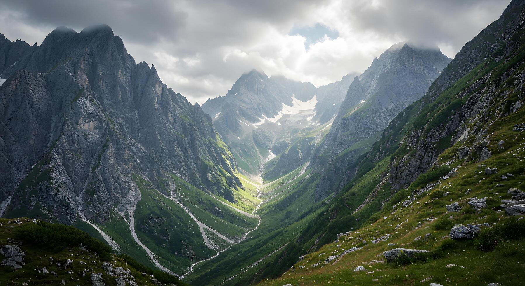 Majestic Mountain Valley Landscape A Breathtaking View of Alpine Peaks and Verdant Slopes Under a Dramatic Sky photo