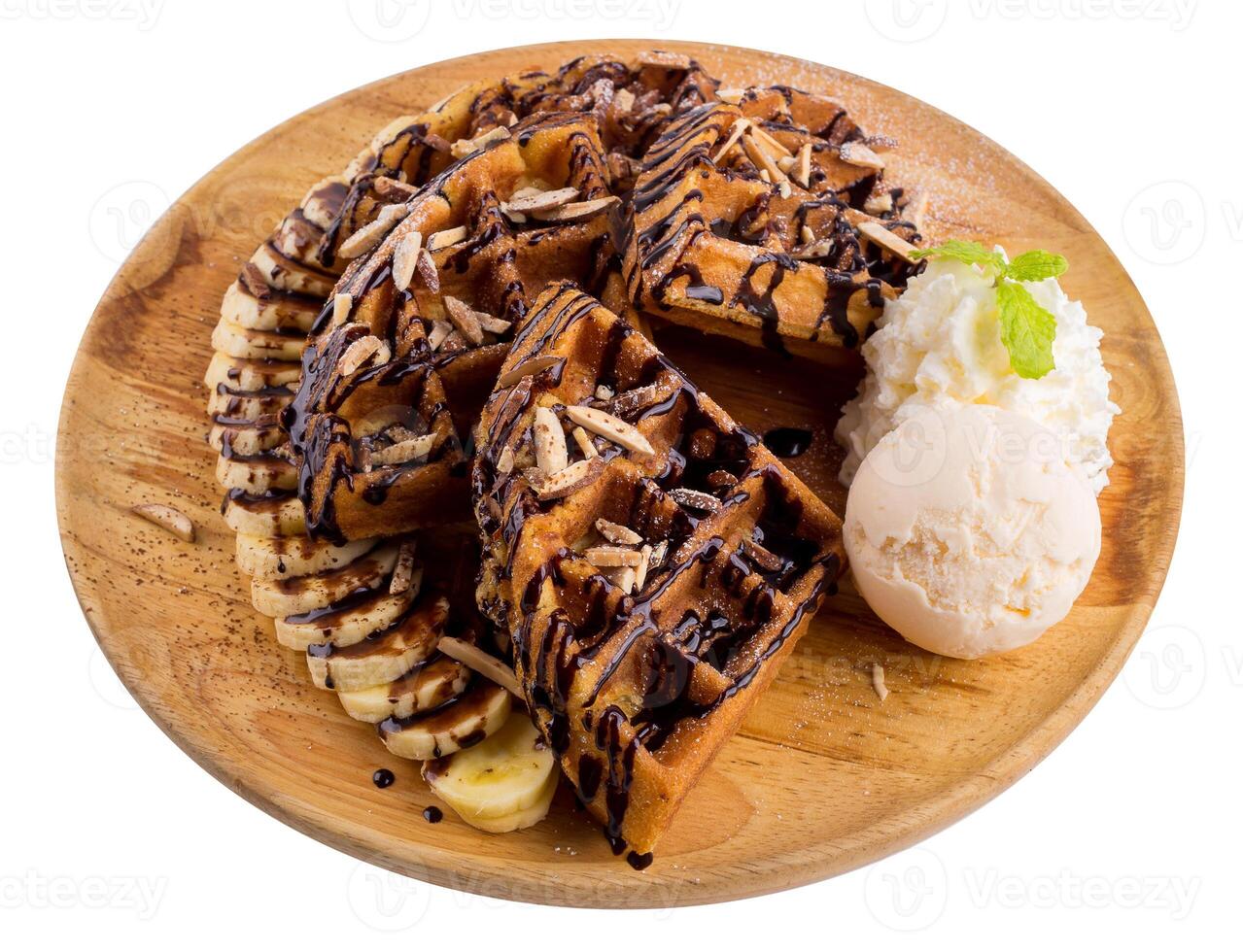Homemade waffle with ice cream and chocolate sauce isolated on a white background. photo