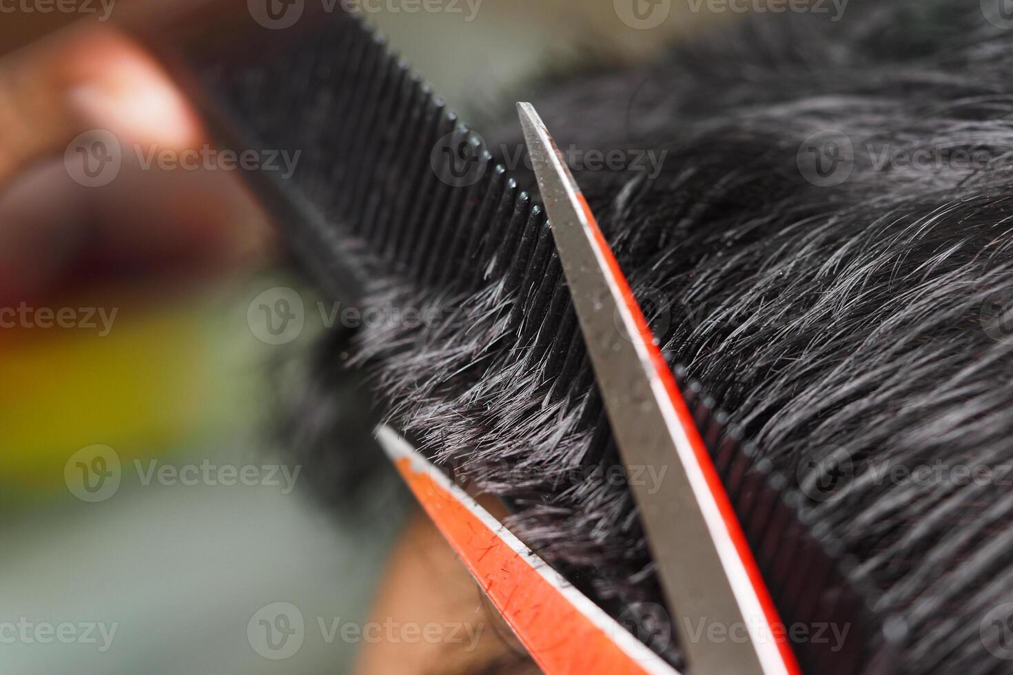 Haircut in progress at a local salon during daylight hours photo