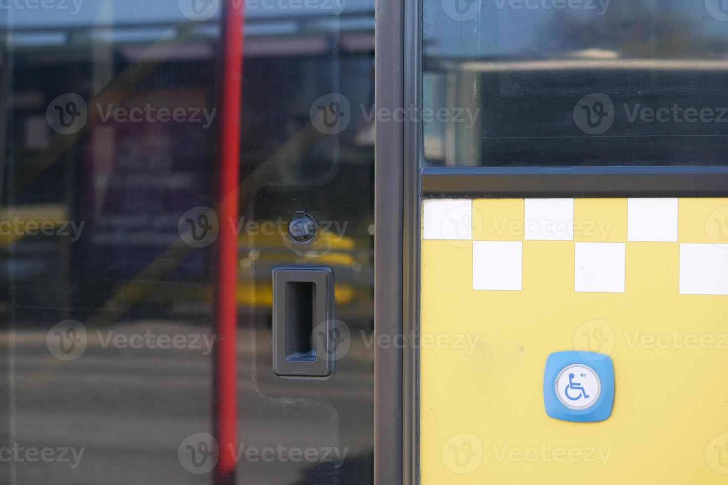 City bus entrance with accessibility features and clear signage photo