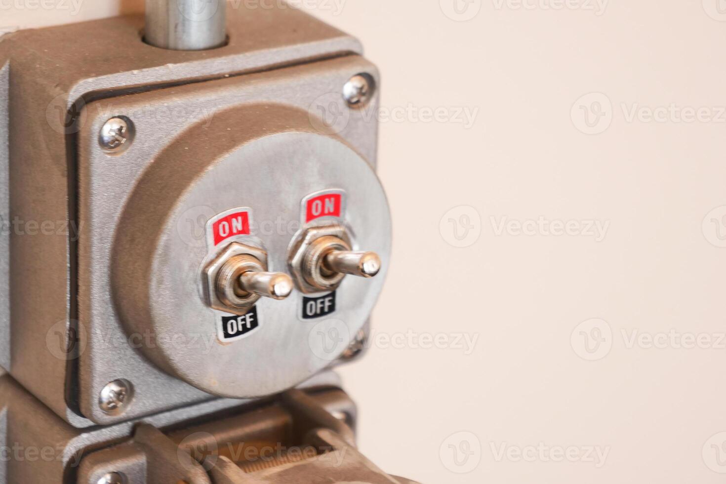Switch panel with two toggle switches located indoors photo