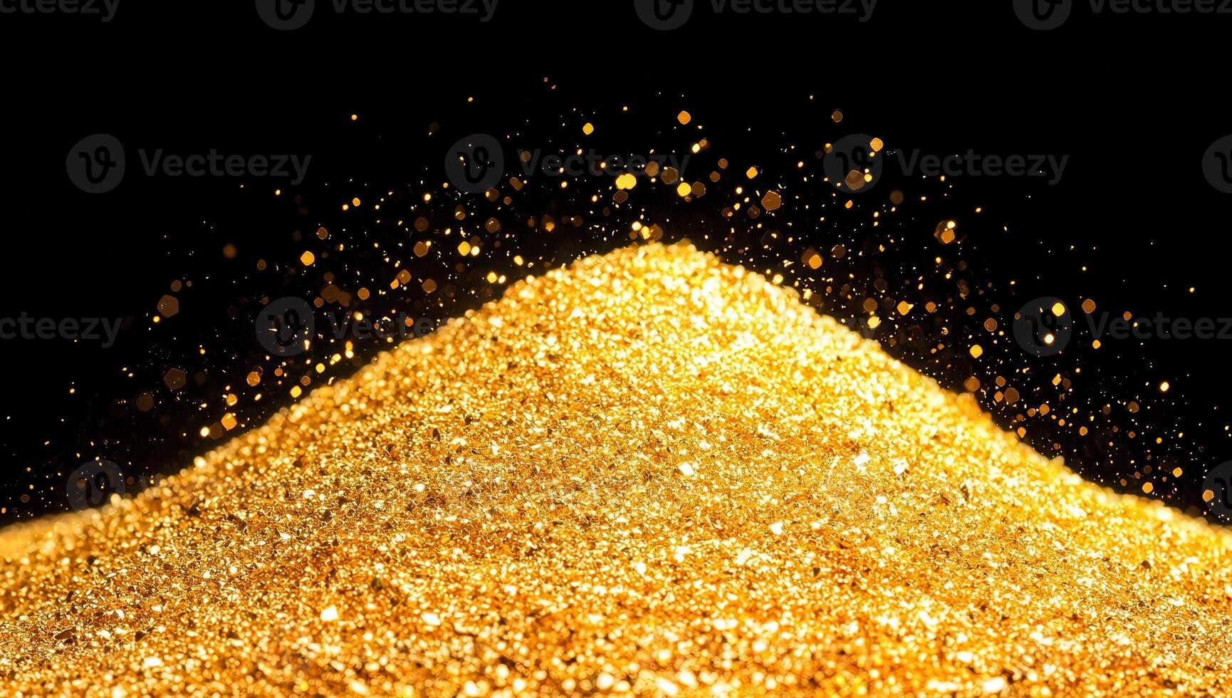 Pile of golden glitter with sparkling particles on a black background. Luxury and festive concept. photo