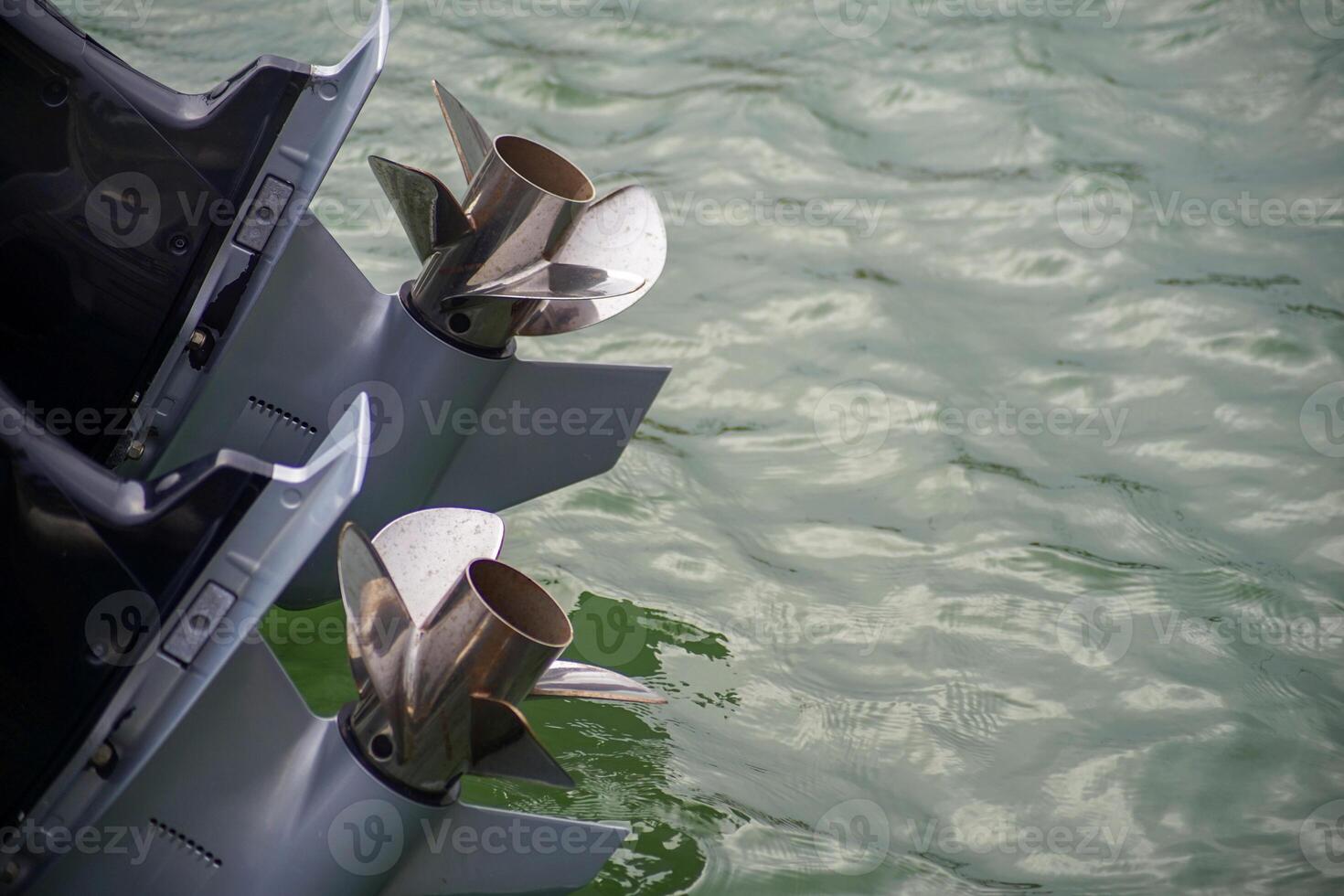 close-up of the propellers of a boat engine photo