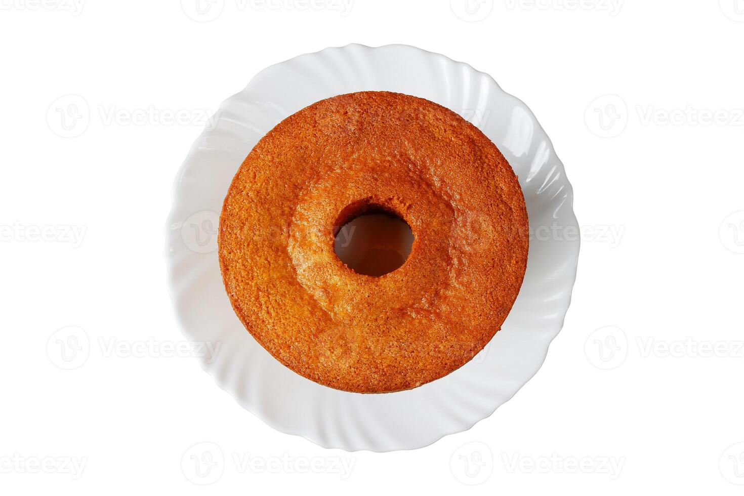 corn cake on white plate isolated on white background. Typical Brazilian party food. photo
